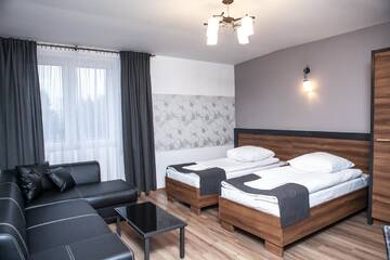 Фото номера Трехместный номер Отель Hotel Bukowiec г. Легьоново 4